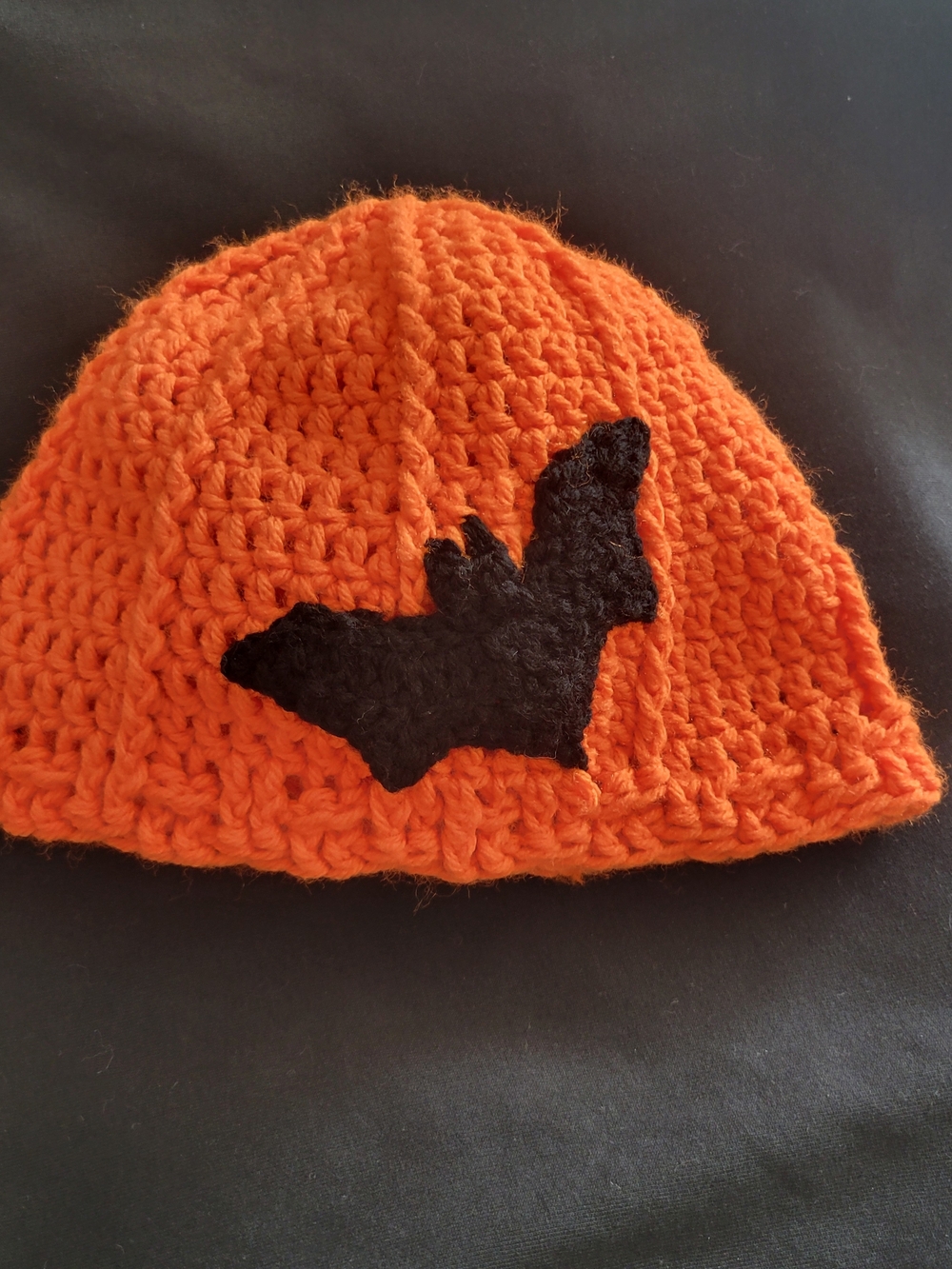 Handmade Orange Crochet Beanie with Black Bat Applique
